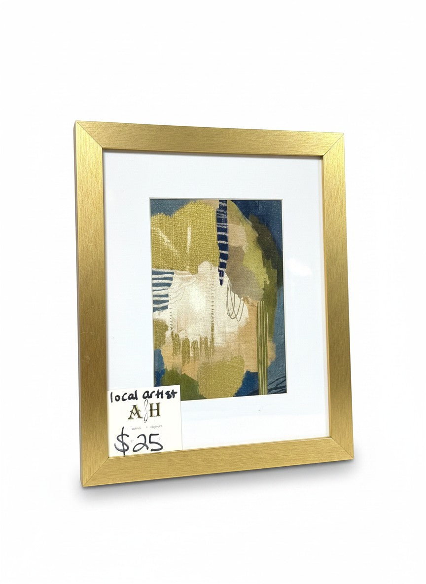 Chic Collective framed abstract art with olive, sand, cream, and navy tones. Features linear details and a brushed gold frame.