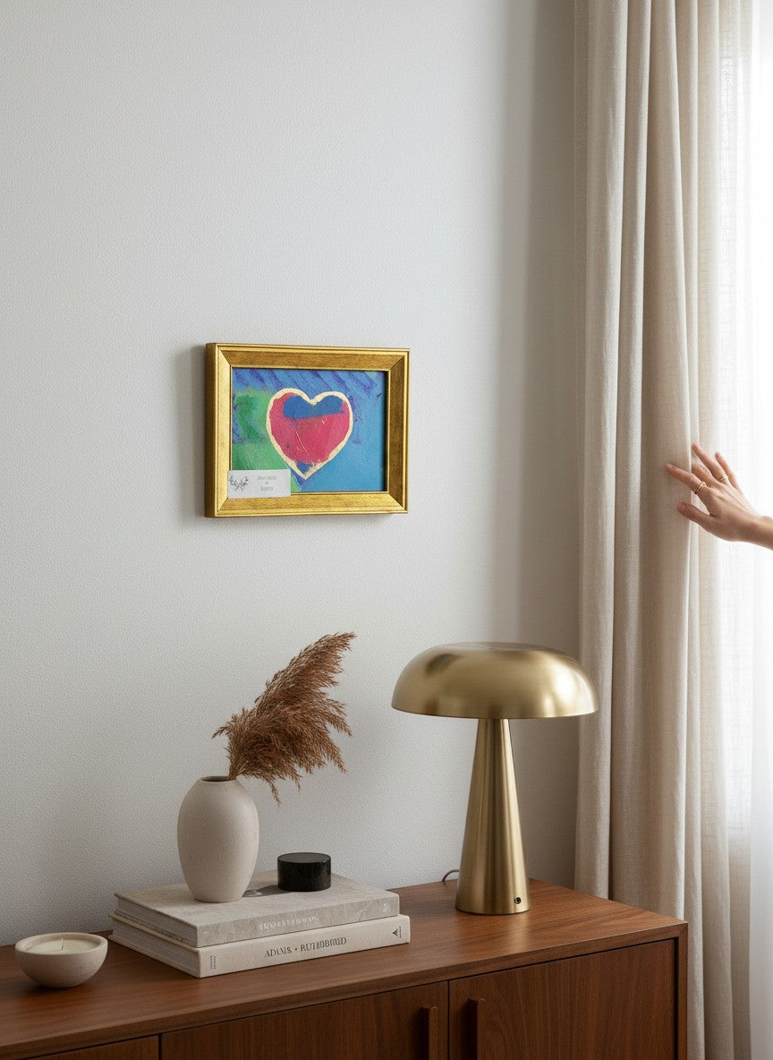Chic Collective abstract painting of a pink heart with gold trim on turquoise and blue background, framed in gold.