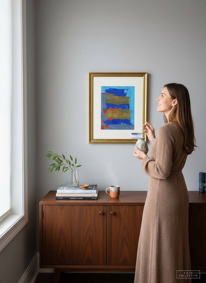 Chic Collective After Midnight abstract art with cobalt, indigo, gold, and crimson bands, framed in gold.