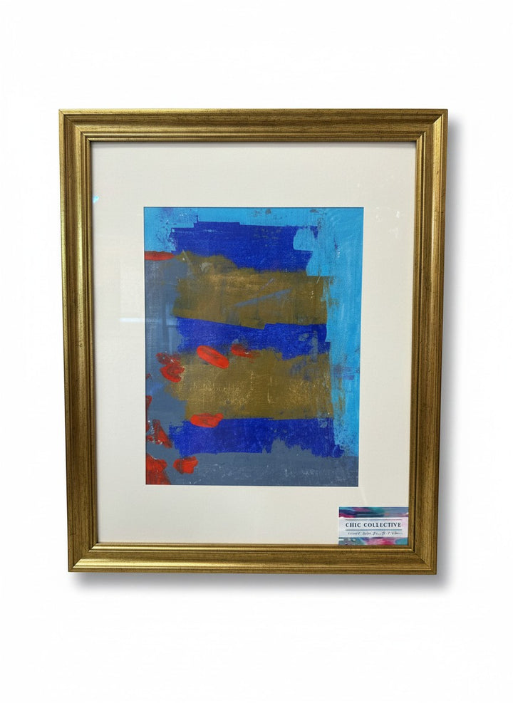 Chic Collective After Midnight abstract painting with cobalt, indigo, gold, and red hues. Framed in gold.