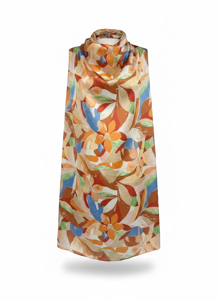 Chic Collective Amalfi Bloom Scarf: Silk scarf with painterly florals in citrus, peach, blue, coral, and green. Lightweight satin finish.