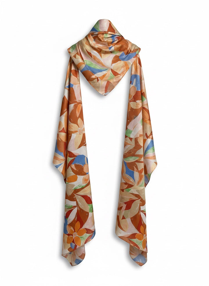 Chic Collective Amalfi Bloom Scarf: Silk scarf with painterly floral print in citrus, peach, blue, coral, and green.