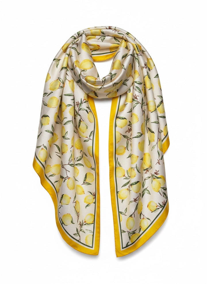 Chic Collective Amalfi Lemon Scarf: ivory satin scarf with watercolor lemons and green leaves, yellow border.