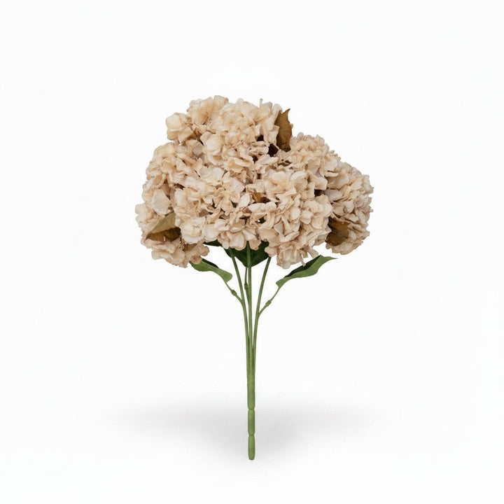 Chic Collective 24" beige artificial hydrangea spray with delicate petals and subtle dried leaves, perfect for tabletop decor.
