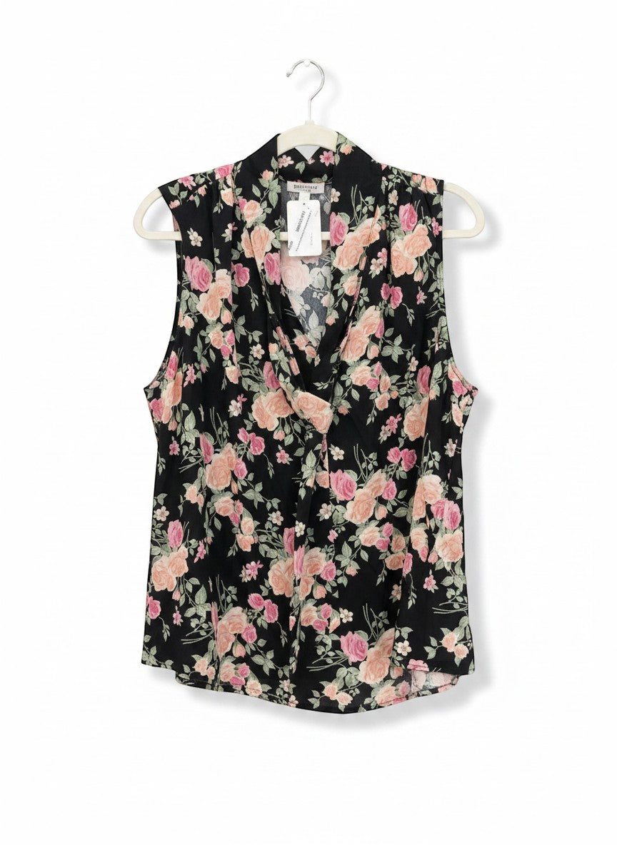Chic Collective sleeveless black blouse with pink and peach floral print and cowl neckline.