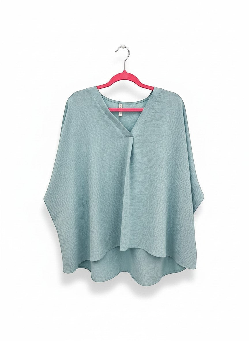 Chic Collective light blue textured V-neck dolman top with relaxed sleeves and a flattering drape.