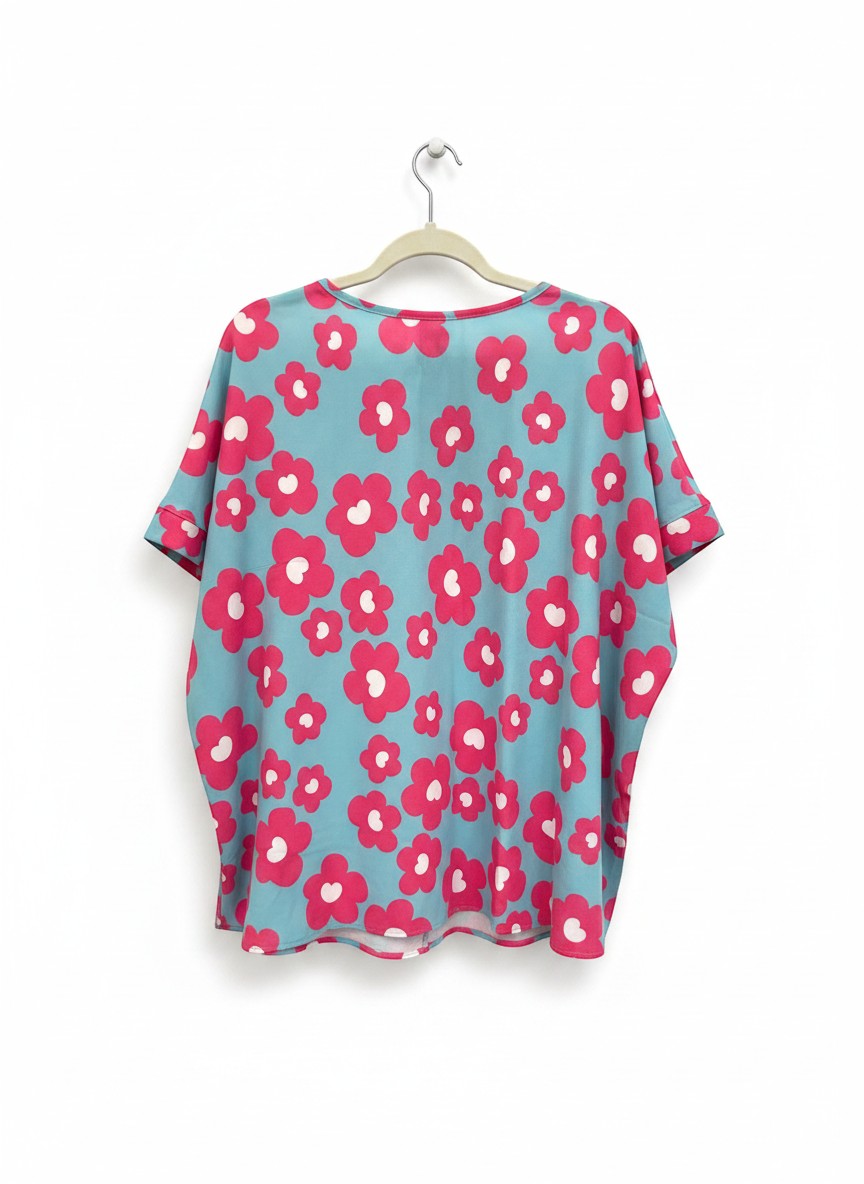 Chic Collective blue top with pink and white floral print, V-neck, short sleeves, relaxed fit.