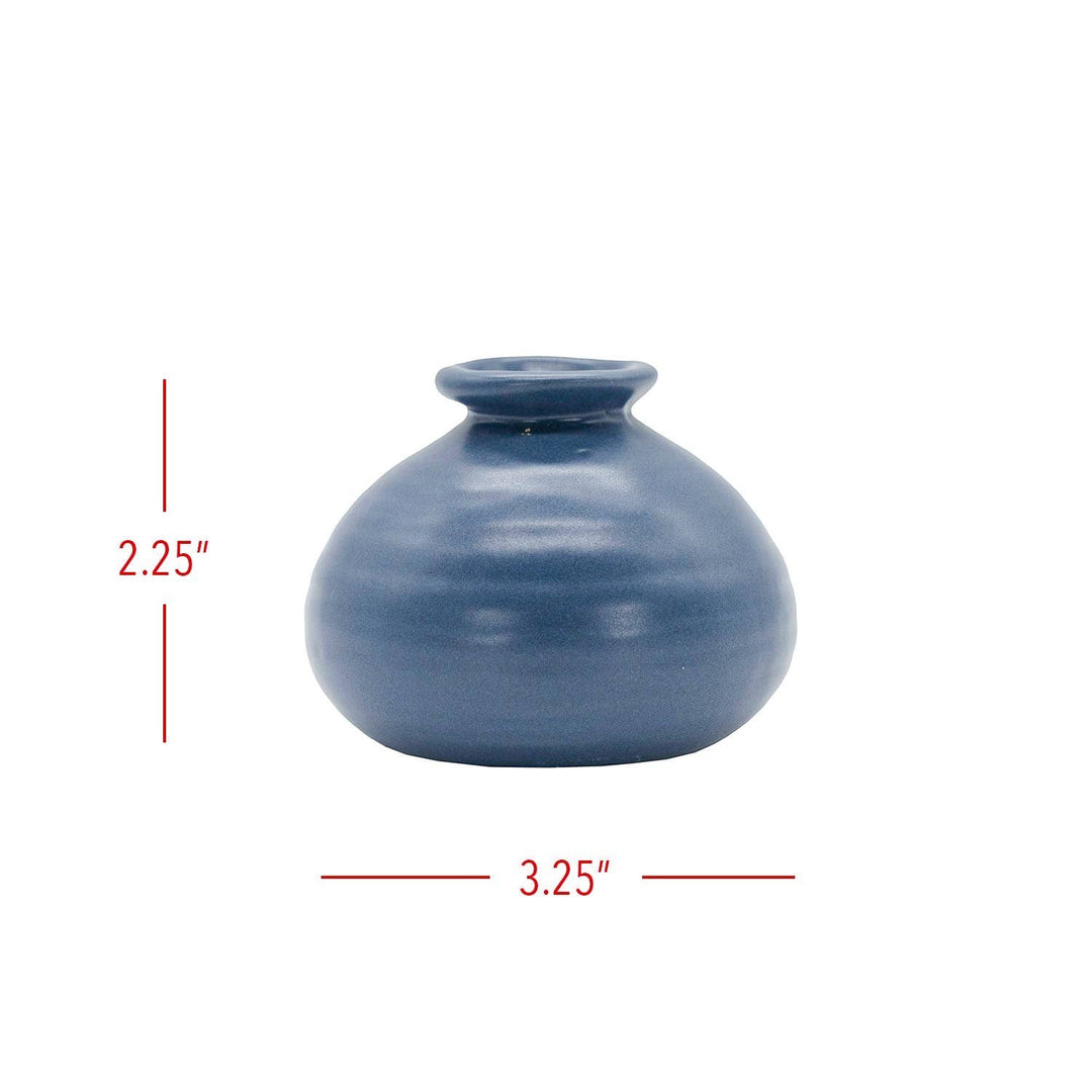 Chic Collective Mattie blue stoneware bud vase with matte glaze and ribbed texture. Perfect for single blooms or dried florals.