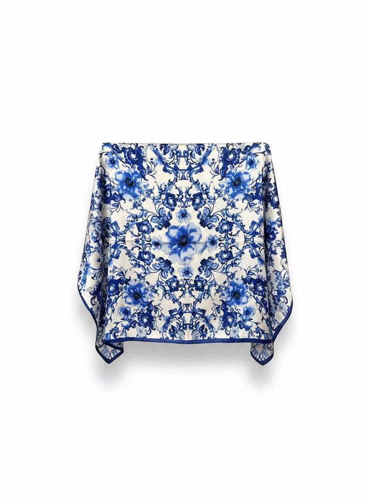 Chic Collective Blue Willow Bloom Scarf: Elegant ivory scarf with intricate cobalt blue floral and botanical print. Lightweight, graceful drape.