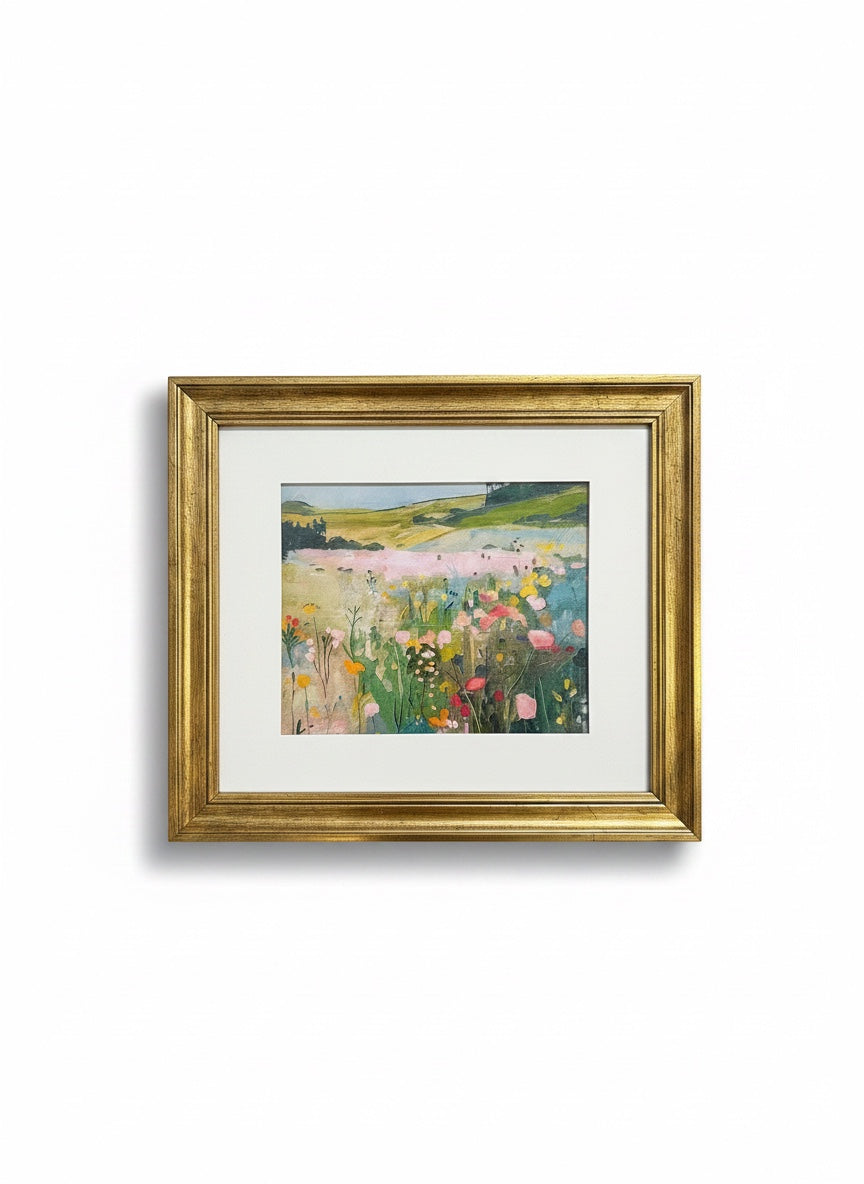 Chic Collective Blush Meadow framed artwork. Impressionistic landscape painting of wildflowers in sage green, dusty blue, blush, yellow, and lavender.