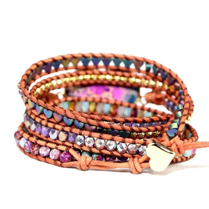 Chic Collective Bohemian Heart Stone Wrap Bracelet with leather cords, colorful beads, and gold accents. Features a heart-shaped charm.
