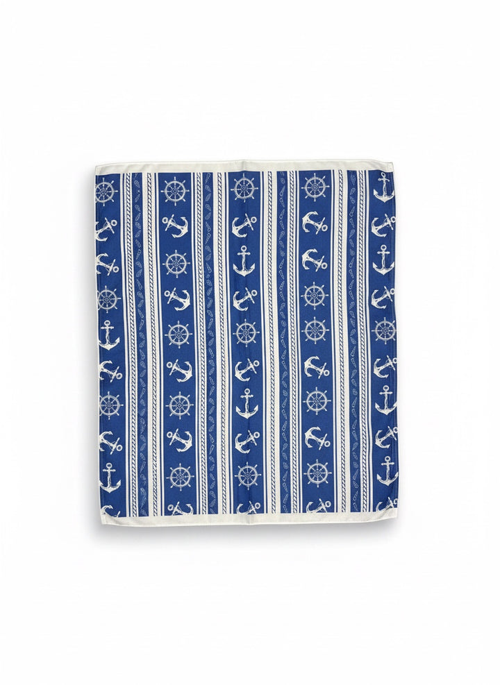 Chic Collective Coastal blue scarf with white anchors, ship wheels, and rope pattern. Lightweight nautical accessory.