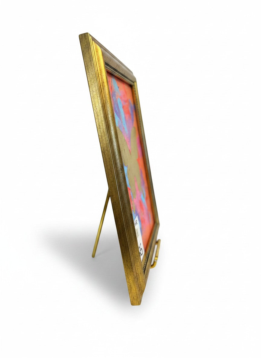 Chic Collective Coral Skies framed artwork with gold butterfly accent, featuring coral, blue, violet, and pink abstract background.