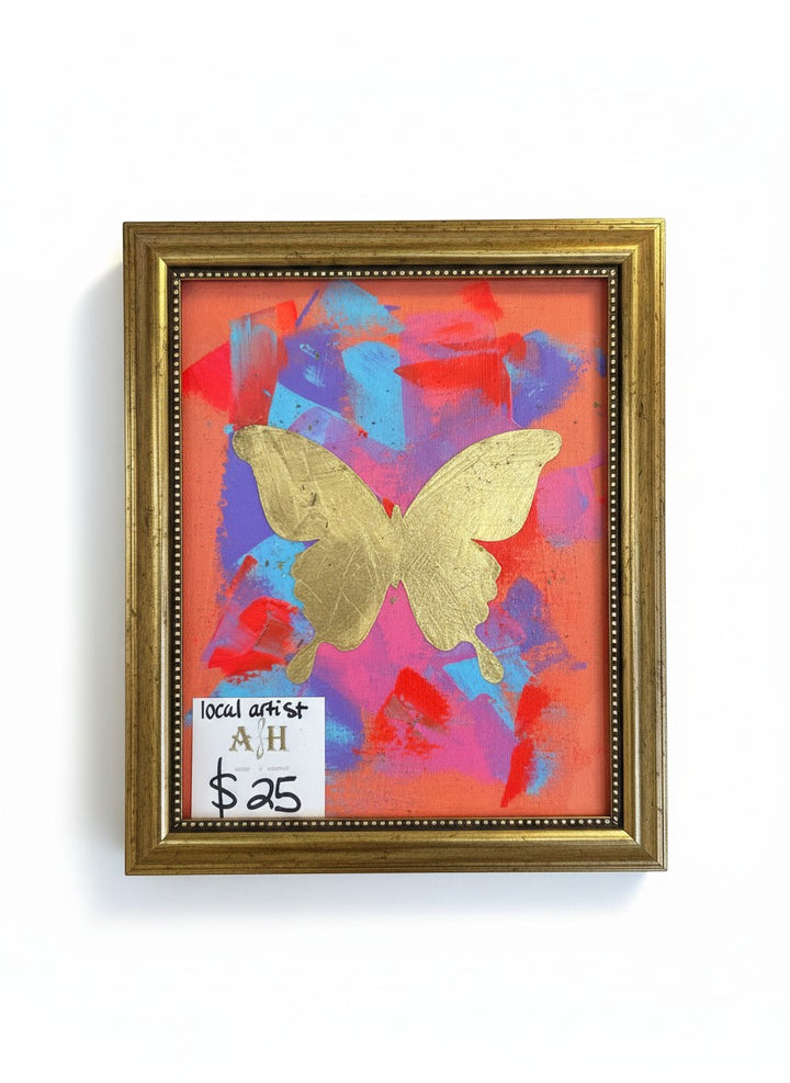 Chic Collective Coral Skies framed painting with gold butterfly, coral, blue, violet, and pink abstract background.
