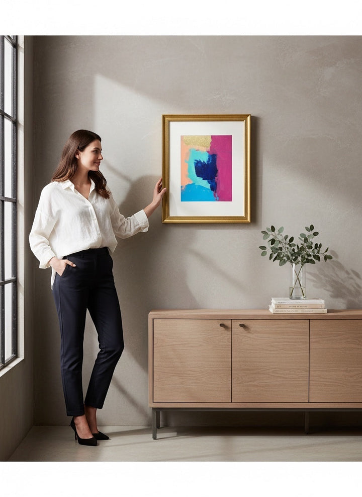 Chic Collective Electric Bloom abstract art with fuchsia, cobalt blue, aqua, blush, and gold. Framed in antique gold.