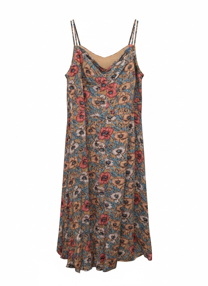 Chic Collective floral print midi dress with spaghetti straps and cowl neckline in tan with coral, blue, and white blooms.