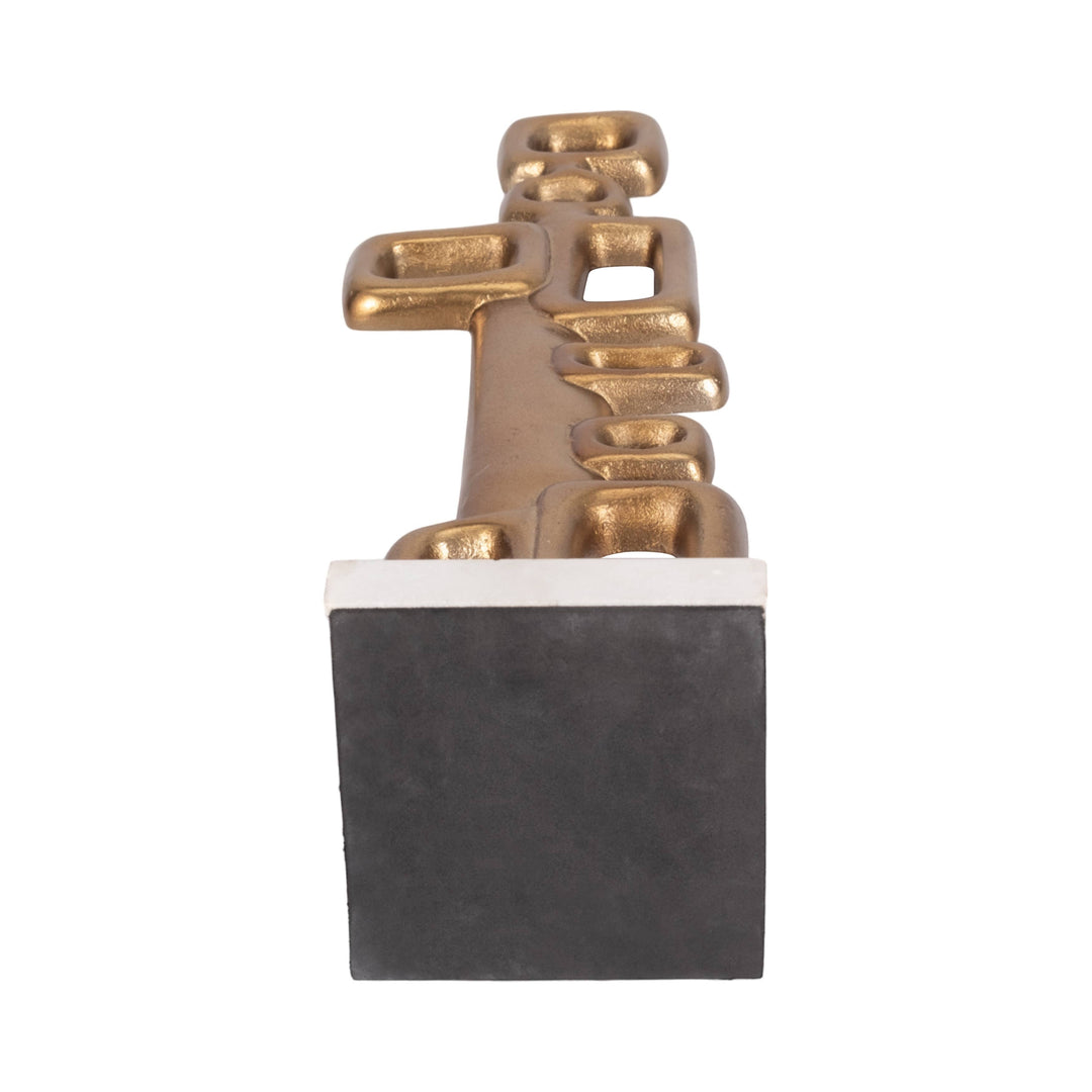 Chic Collective gold abstract metal sculpture with open rectangle design on a marble and dark base.