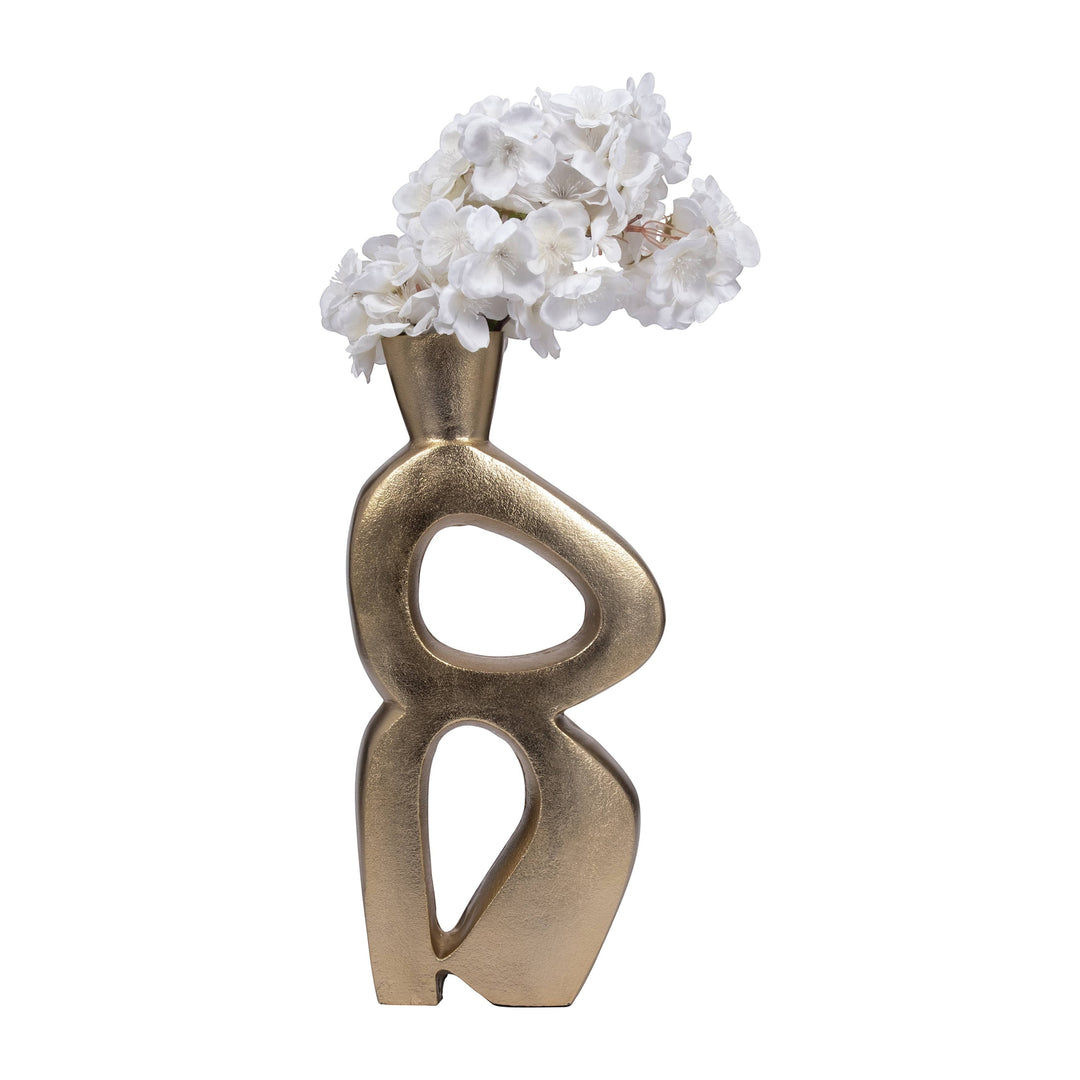 Chic Collective gold abstract ceramic vase with white flowers. Modern sculptural design.