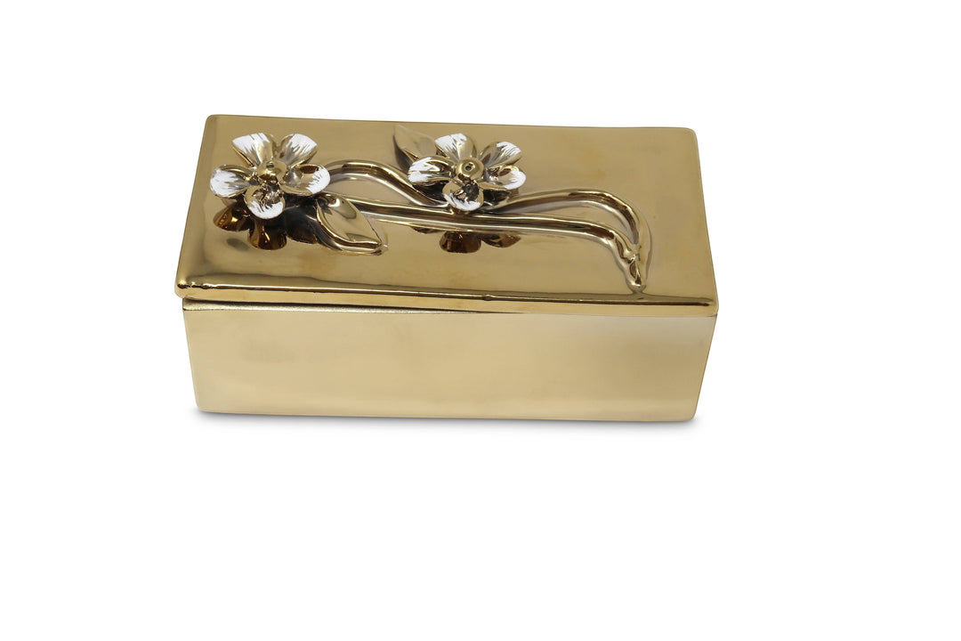 Chic Collective oblong gold decorative box with flower design lid, made of metal with a shiny finish.