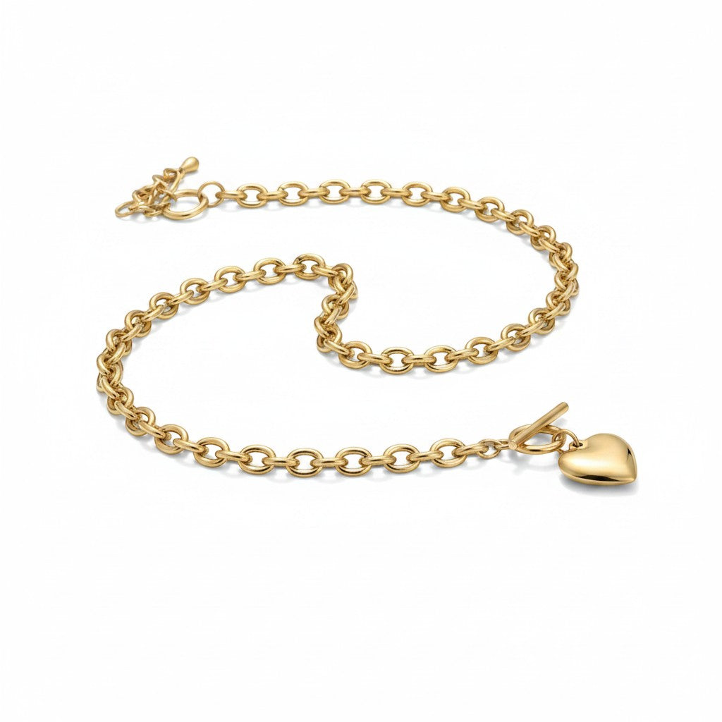 Chic Collective gold-tone chunky link chain necklace and bracelet set with heart charm and toggle clasp.