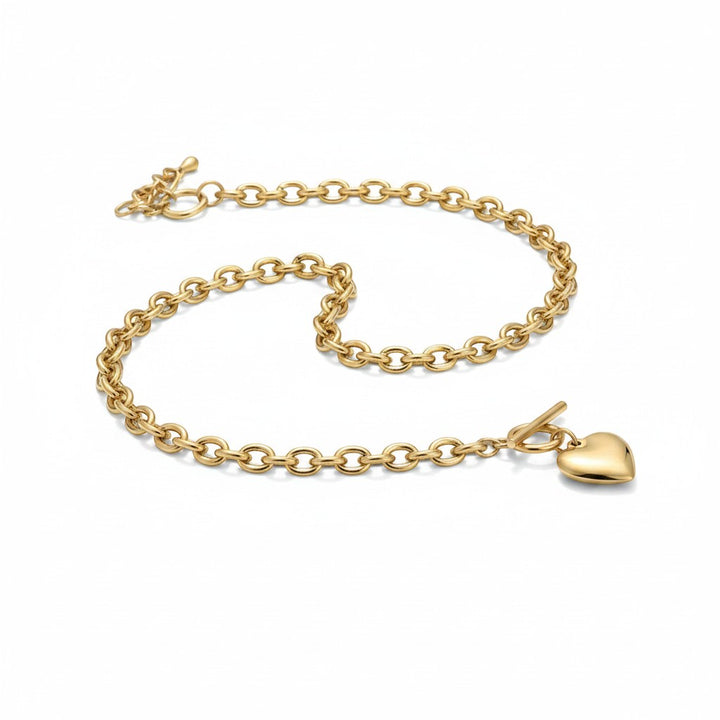 Chic Collective gold-tone chunky link chain necklace and bracelet set with heart charm and toggle clasp.