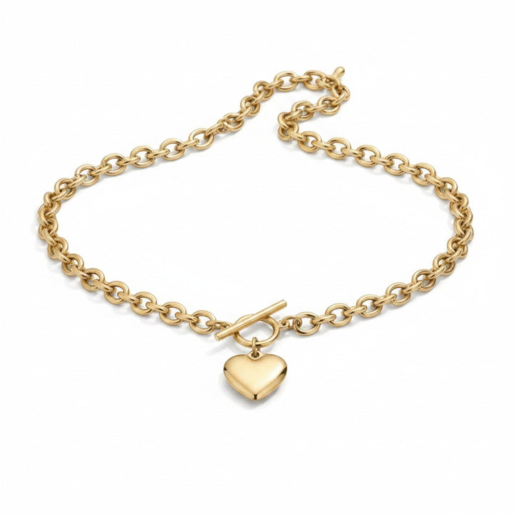 Chic Collective gold-tone chunky link chain necklace with heart charm and toggle clasp.