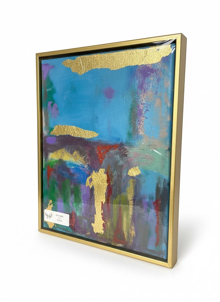 Chic Collective Golden Echoes abstract painting with teal, plum, green, lavender, and gold leaf accents. Framed in gold.