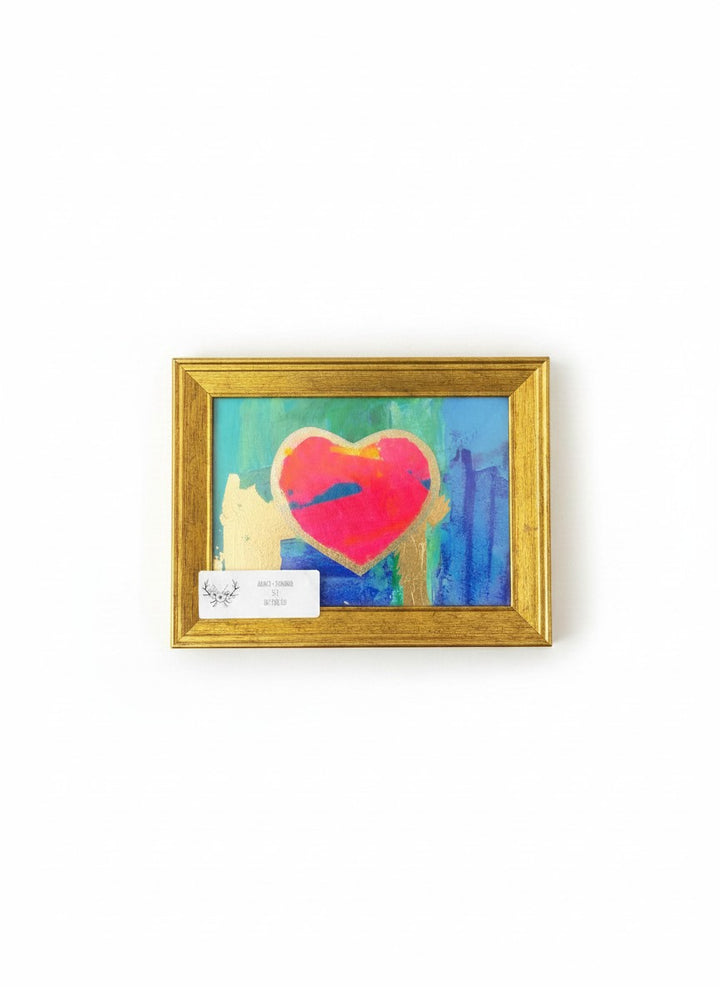 Chic Collective Golden Horizon abstract painting with pink heart, gold leaf, and blue background. Textured art.