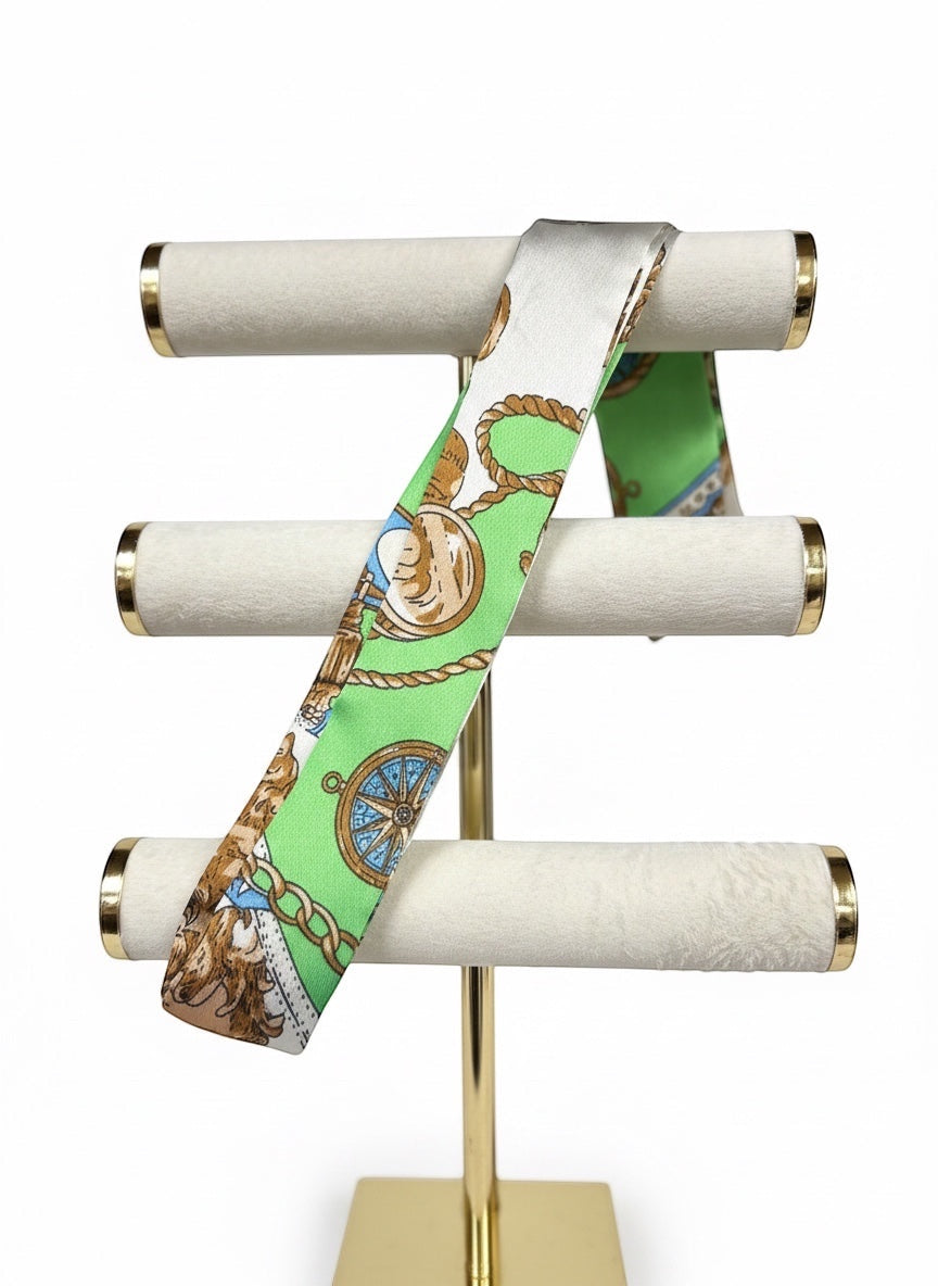 Chic Collective green and white nautical print silk ribbon tie with compass and rope details.