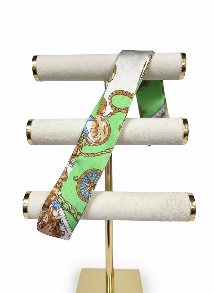 Chic Collective green and white nautical print silk ribbon tie with compass and rope details.