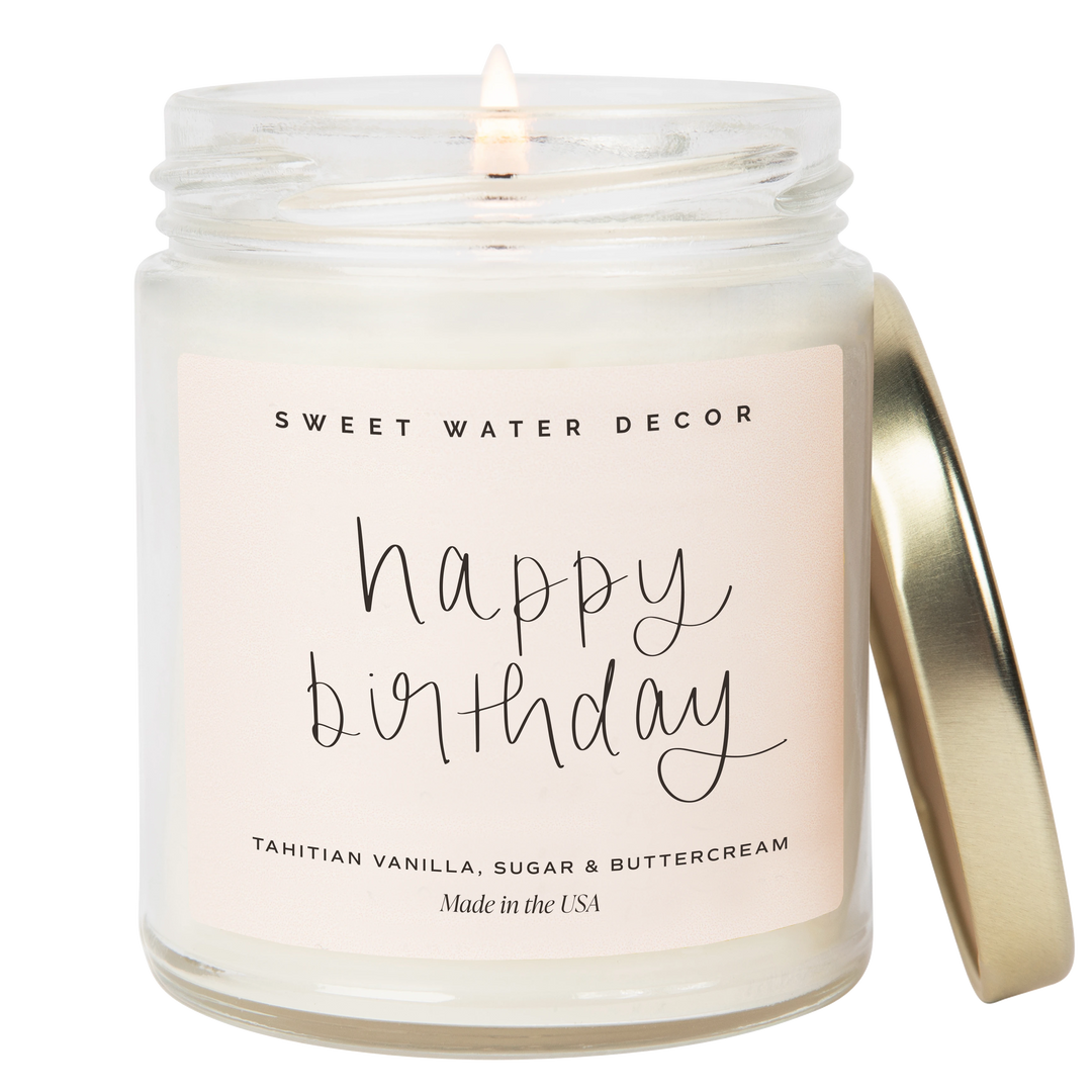 Chic Collective Happy Birthday vanilla buttercream scented soy candle in a clear jar with a gold lid.