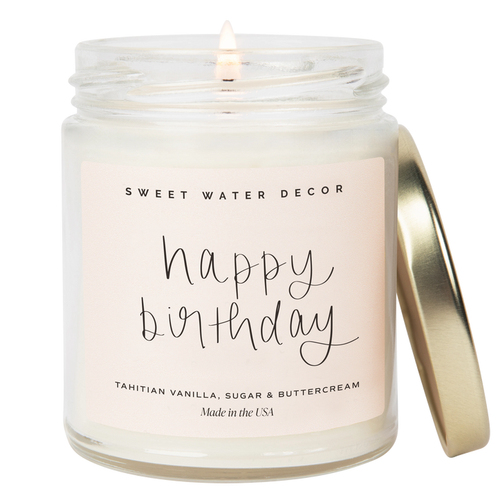 Chic Collective Happy Birthday vanilla buttercream scented soy candle in a clear jar with a gold lid.