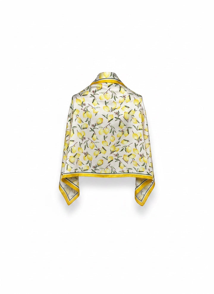 Chic Collective ivory satin scarf with watercolor lemons and green leaves, yellow border. Lightweight and silky.