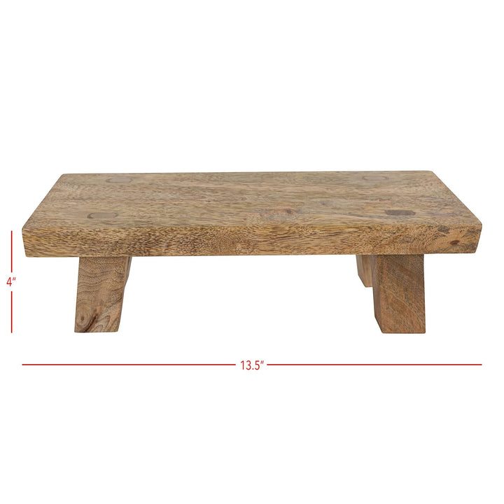 Chic Collective Hazel footed stool made of natural mango wood, 13.5" long, 4" high, for serving or decor.