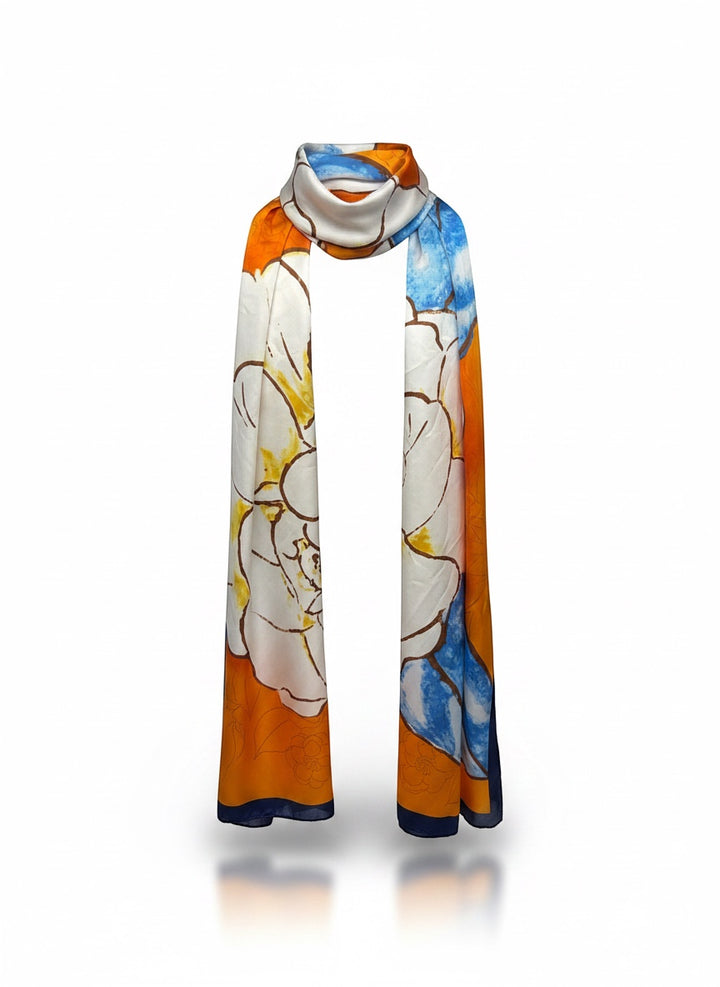 Chic Collective Marigold Bloom Scarf: oversized ivory florals on marigold orange with blue accents. Lightweight silk.