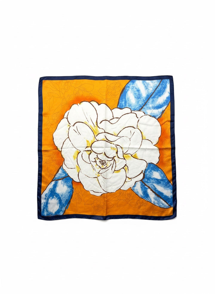 Chic Collective Marigold Bloom Scarf: Oversized ivory floral on marigold orange with blue leaves. Silk.