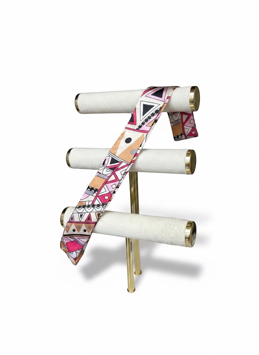 Chic Collective The Marrakech Muse Ribbon Tie in blush pink, magenta, camel, black, and lavender geometric print silk.