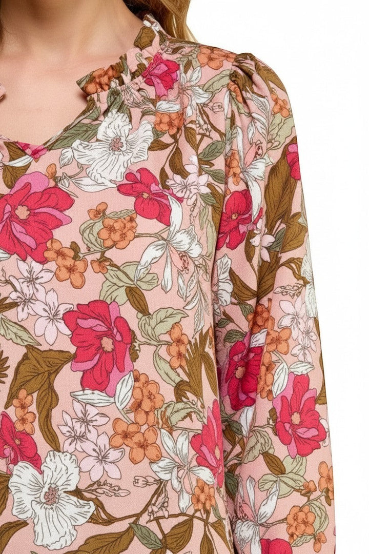 Chic Collective Les Amis Mauve Floral Top L. Pink blouse with a ruffled neckline and puffed sleeves, featuring a vibrant floral print.