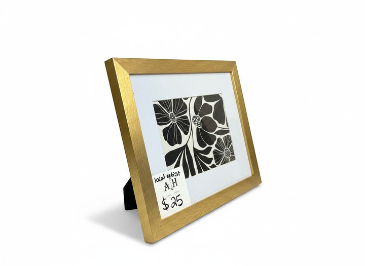 Chic Collective Midnight Botanica framed art print with black and ivory floral design. Gold frame.
