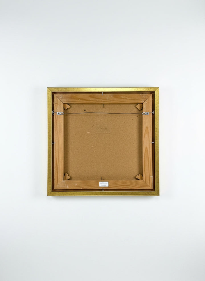 Chic Collective Midnight Garden Glow framed artwork with gold frame, featuring deep emerald, blue, charcoal, and blush tones with metallic gold accents.