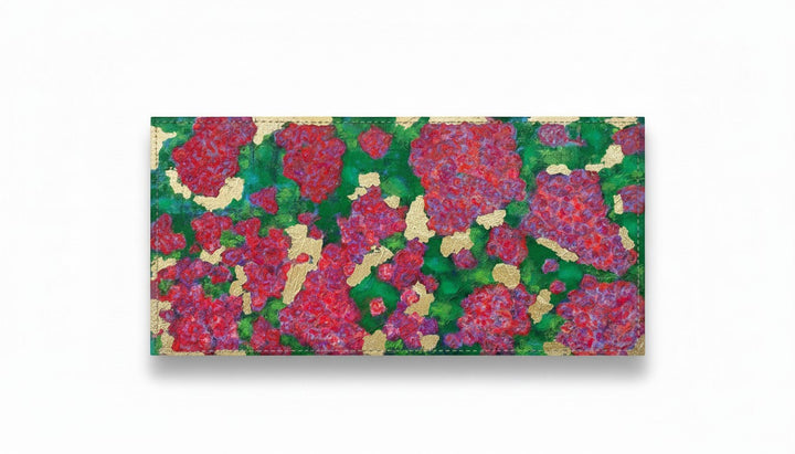Chic Collective Midnight Garden in Bloom clutch with vibrant crimson, fuchsia, violet, and magenta florals on emerald green with gold leaf accents.