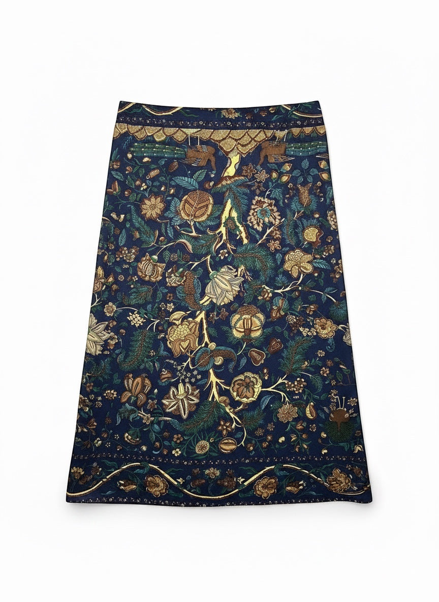Chic Collective Midnight Garden Scarf in navy with intricate floral, vine, and woodland motifs in teal, gold, and olive.