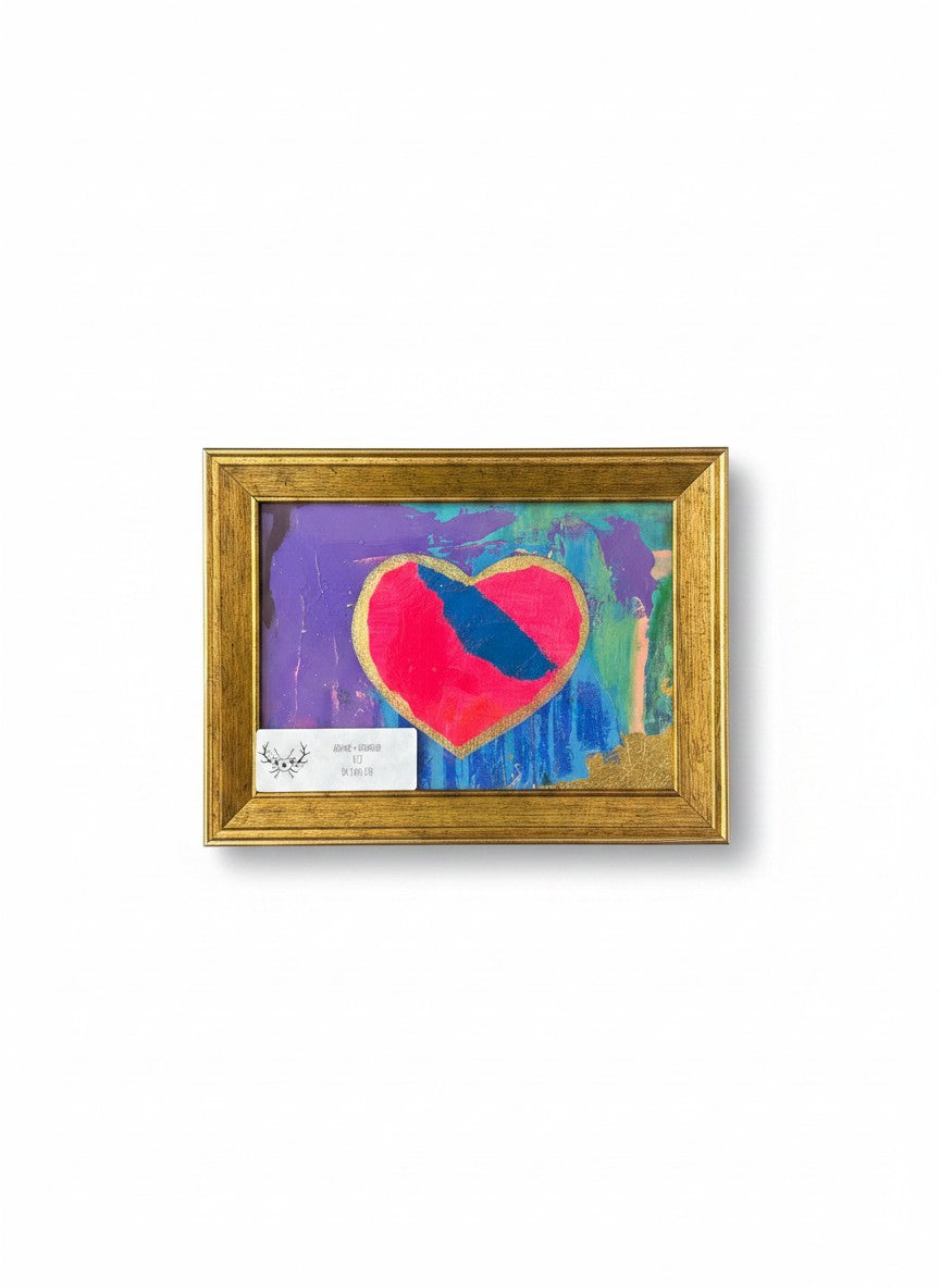 Chic Collective Midnight Kiss framed abstract art painting with fuchsia heart, cobalt blue accent, and gold leaf details.