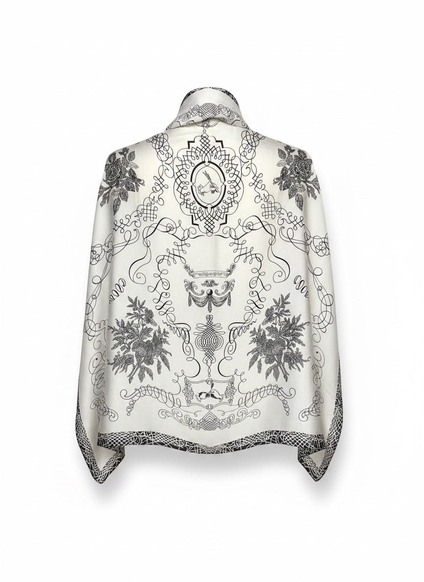 Chic Collective The Midnight Manor Scarf: Ivory satin with black ornamental, botanical, and architectural detailing. Elegant and timeless.