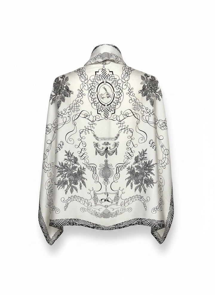 Chic Collective The Midnight Manor Scarf: Ivory satin with black ornamental, botanical, and architectural detailing. Elegant and timeless.