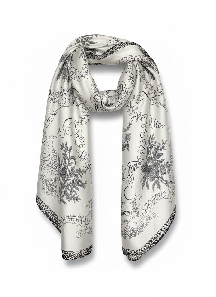 Chic Collective The Midnight Manor Scarf: ivory satin with black ornamental floral and script detailing.