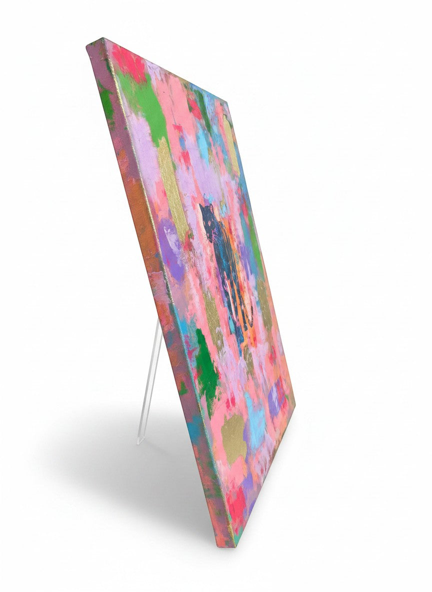 Chic Collective Midnight Muse abstract painting with a black panther silhouette on a vibrant pink, lavender, turquoise, emerald, and coral background with gold leaf accents.