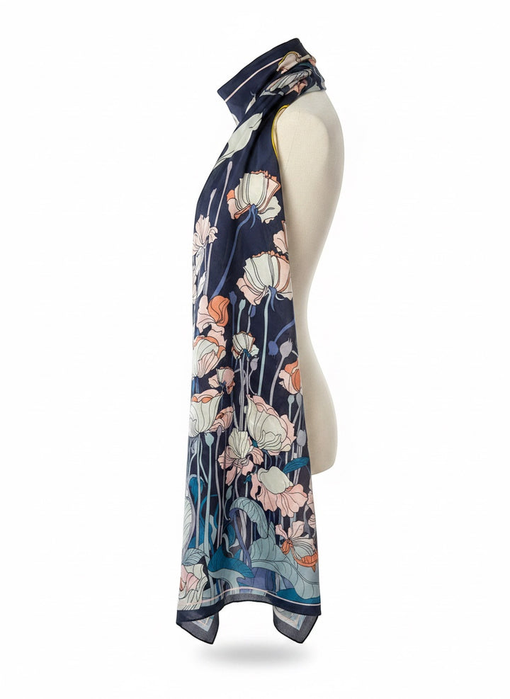 Chic Collective Moonlit Meadow Scarf: navy blue with ivory, blush, peach, and blue floral print. Lightweight, artistic.