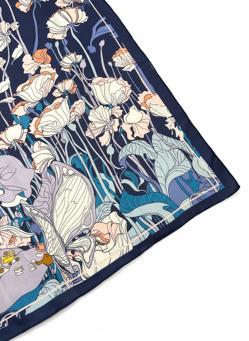 Chic Collective Moonlit Meadow Scarf: Navy silk scarf with ivory, blush, peach, blue, and lavender floral print.