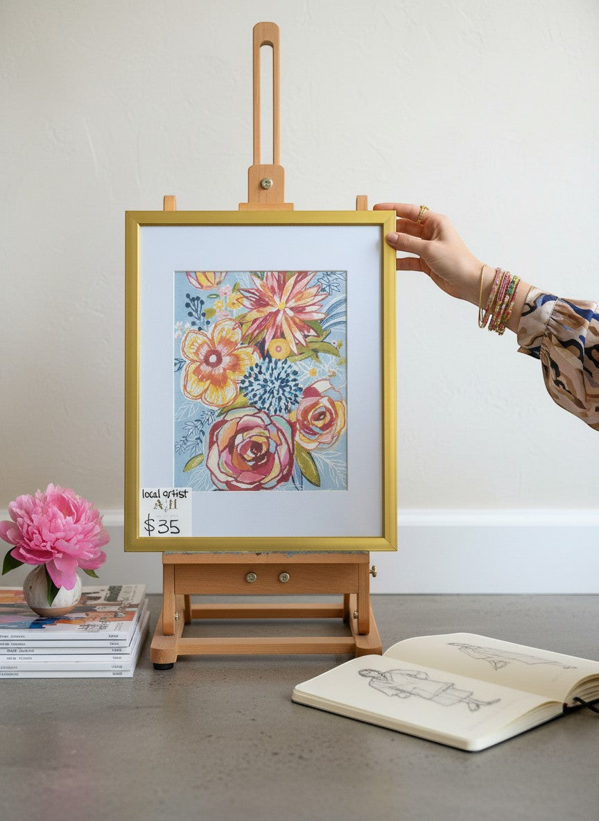 Chic Collective Morning Bloom Society framed floral art print with coral, blush, and yellow blossoms on sky blue background.